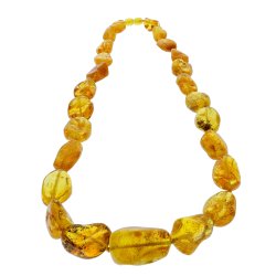 Elegant Kde Med gte Honningfarvet Ravklumper