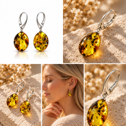 Store ovale rav�reringe med �gte gyldent rav og 925 sterling s�lv. Unikke naturlige strukturer og elegant skandinavisk design.