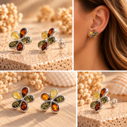 Smukke Blomster rav�reringe med �gte rav i gr�nne, cognac- og gyldne nuancer. Elegant design i sterling s�lv med fem dr�beformede ravstykker