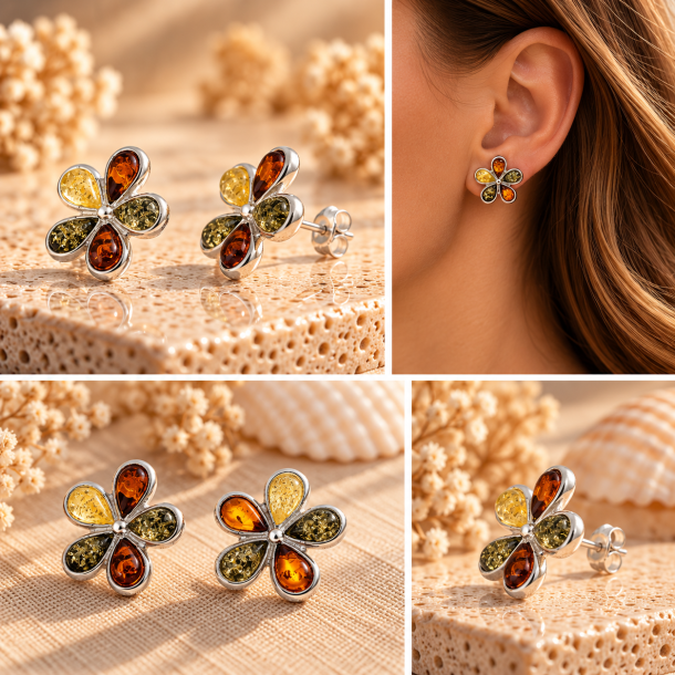 Smukke Blomster rav�reringe med �gte rav i gr�nne, cognac- og gyldne nuancer. Elegant design i sterling s�lv med fem dr�beformede ravstykker