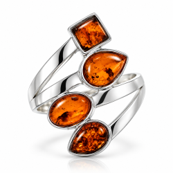 Elegant Ravring i Moderne Design � Unik S�lvring med 4 Cognacfarvede Ravstykker