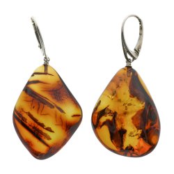 Unikke ravreringe, hndlavede og polerede, fanger Jurassic -periodens sknhed 