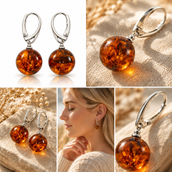 Eksklusive rav�reringe med store runde perler af �gte cognac rav og 925 sterling s�lv. Smukke naturlige strukturer g�r hvert par unikt.