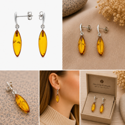Elegante h�ngende rav �reringe med �gte gyldent rav og 925 sterling s�lv. Tidl�st design med smukke aflange ravstykker.