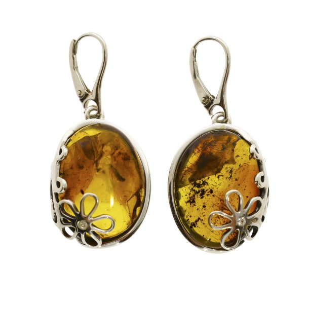 Unikke h�ndlavede ovale rav�reringe i gyldent cognac rav og 925 sterling s�lv med blomstermotiv