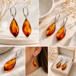 Exklusive lange Bernstein-Ohrringe aus echtem Bernstein und 925 Sterling Silber. Die gro�en, kantig geschliffenen Bernsteine begeistern mit warmen Gold- und Cognact�nen sowie individuellen nat�rlichen Strukturen.