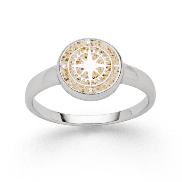 Kompas ringen i Strand sand
