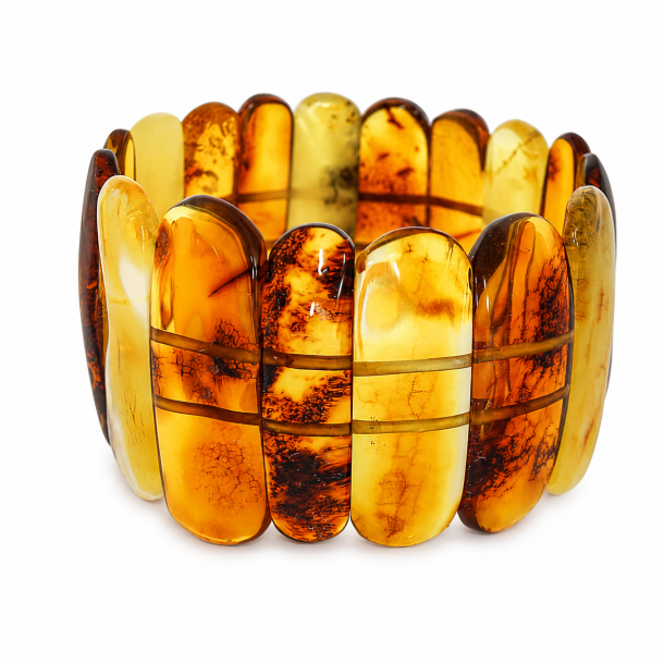 Eksklusivt h�ndlavet armb�nd med flerfarvet Vesterhavet rav i cognac-, honning- og creme nuancer. Elegant statement smykke i luksusdesign.